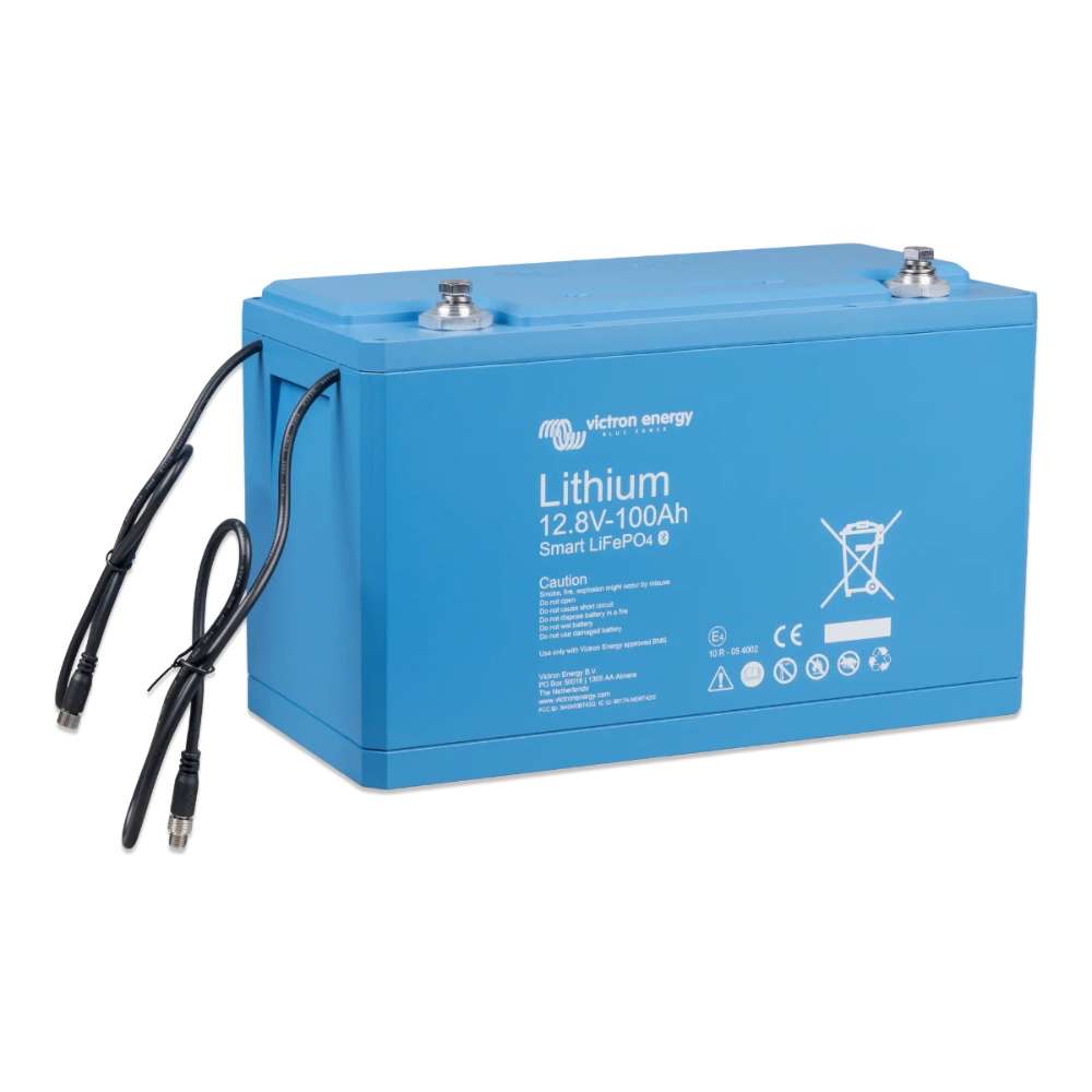 Blue battery with wires hanging over its edge is pictured from an angle, labeled Victron Energy 12.8V 100Ah Smart LiFePO4 Lithium Battery-BAT512110610