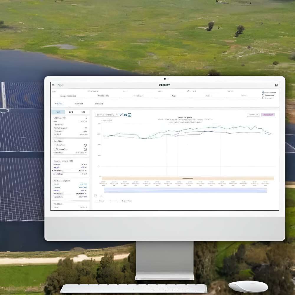 Computer screen shows solar performance data with a field of solar panels behind it, illustrating monitoring supported by the Tigo Energy 200A Automatic Transfer Switch w Generator Support-801-200200-0301