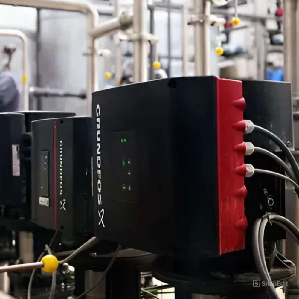 Grundfos PC10-211F 500' Roll Pump Wire 10/2 w/ Ground connects to large industrial control units and cables inside a mechanical room