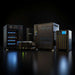 Outback Power FXR Sealed E Series FXR2012E 2000W 12VDC Inverter/Charger shown among large black power-storage cabinets in a dark studio setting