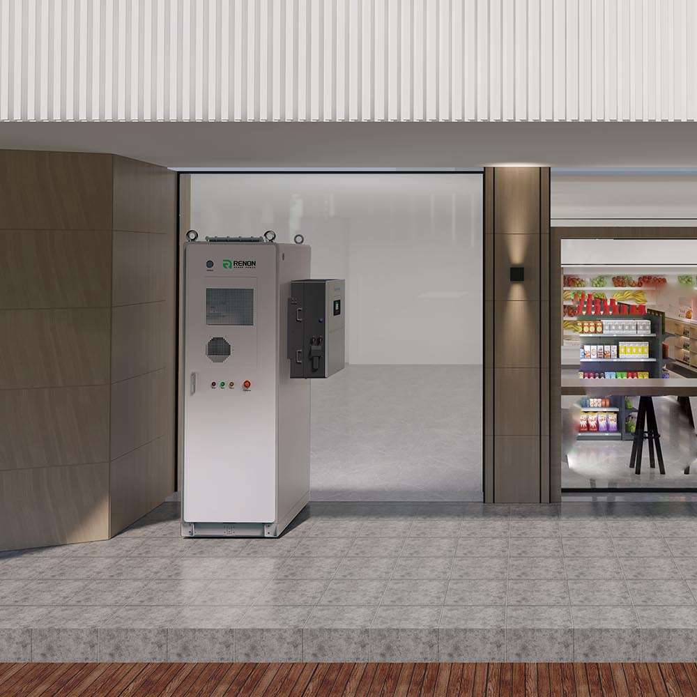 Renon Power ECube 60AP 61kWh Lithium Battery System-ECUBE61K stands under a covered commercial entrance, showing its front vents and indicator lights