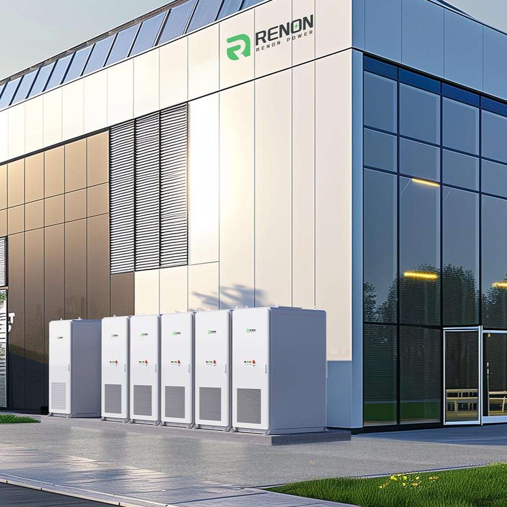 Several white battery cabinets stand outside a modern building, showing a large installation of the Renon Power MPack 233A 233kWh Liquid-Cooling Lithium Battery-MPACK233K