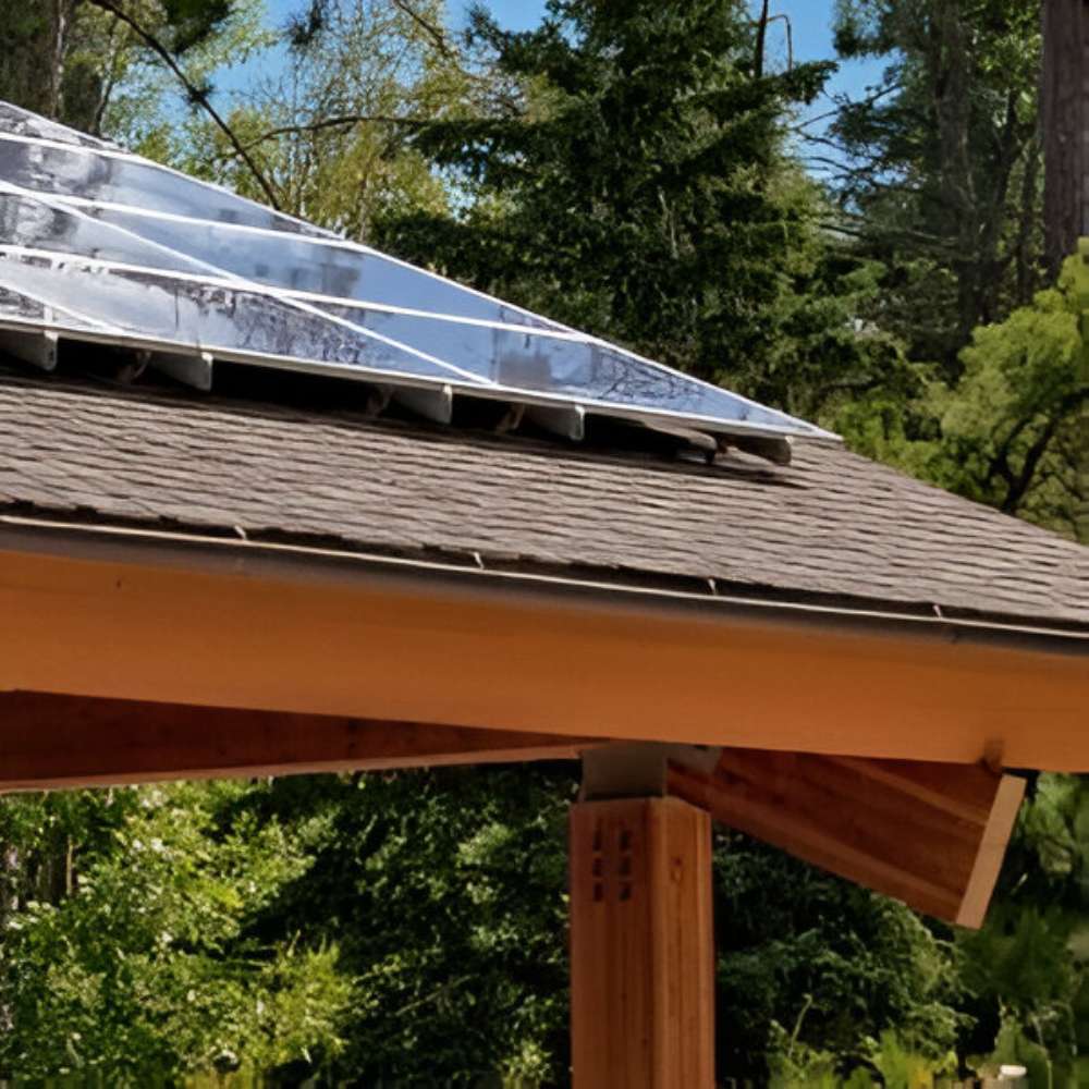 Solar panels on a wooden structure’s roof reflect sunlight for use with the Magnum Energy MS-PE Series MS4124PE 4100W 24VDC Pure Sine Inverter Charger