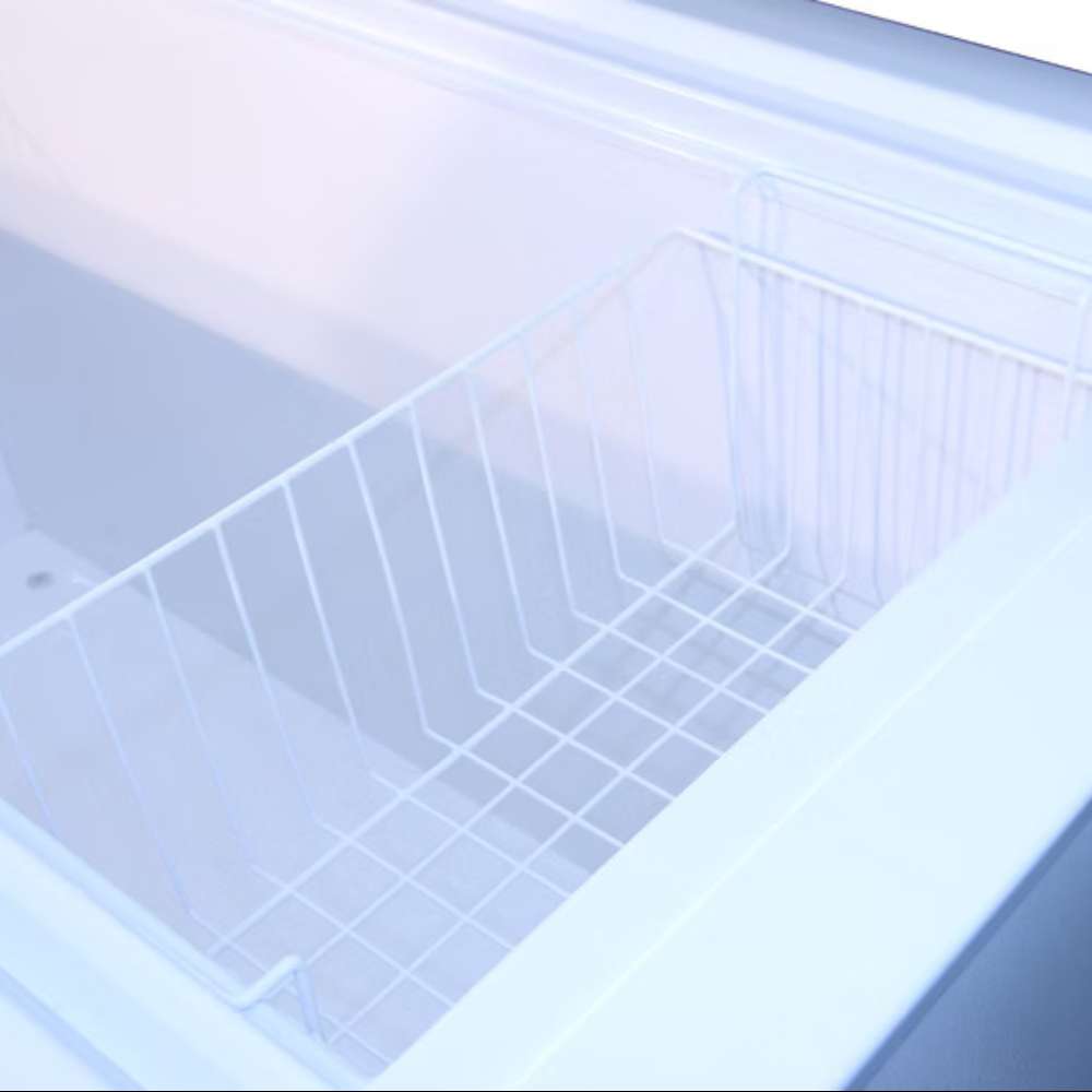 SunStar ST-15CF 15 cu.ft. DC Powered Chest Freezer/Refrigerator is shown from above with the lid open, revealing a deep interior with white wire storage baskets