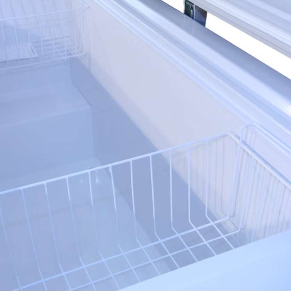 SunStar ST-15CF-AC 15 cu.ft. AC Powered Chest Freezer/Refrigerator is shown open from above, revealing a spacious insulated interior