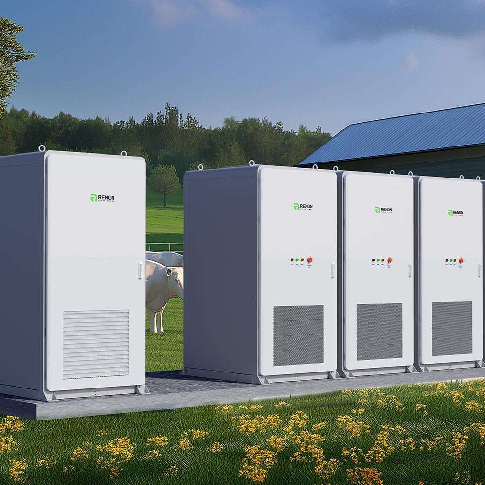 White battery cabinets sit outdoors near grass and farm buildings, showing rural use of the Renon Power MPack 233A 233kWh Liquid-Cooling Lithium Battery-MPACK233K