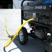 Quality generator by DuroMax, model XP4400E-CA, with yellow extension cord connected and ready for use.