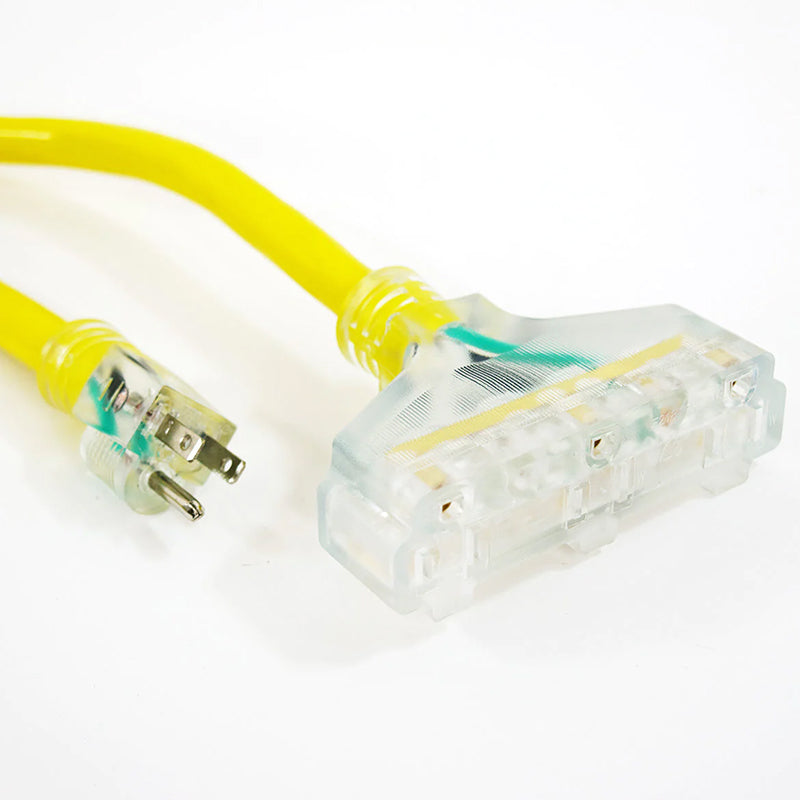 Close-up of the clear plug of a DuroMax heavy-duty extension cord showing the wiring and sturdy construction.