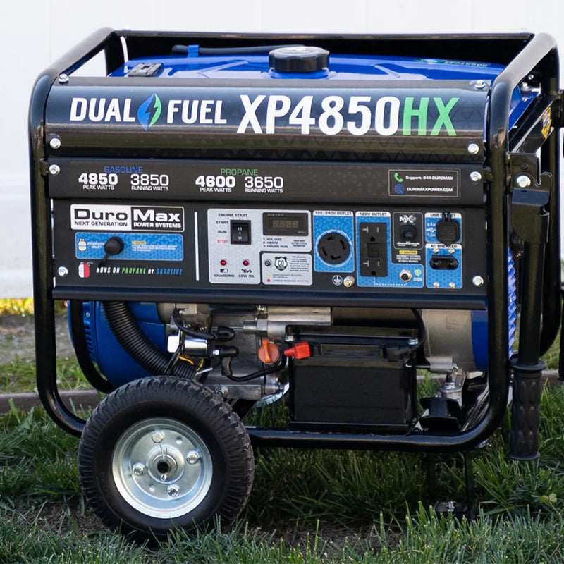 Close-up of DuroMax XP4850HX portable generator showcasing its control panel and dual fuel capabilities in a home garden setting.