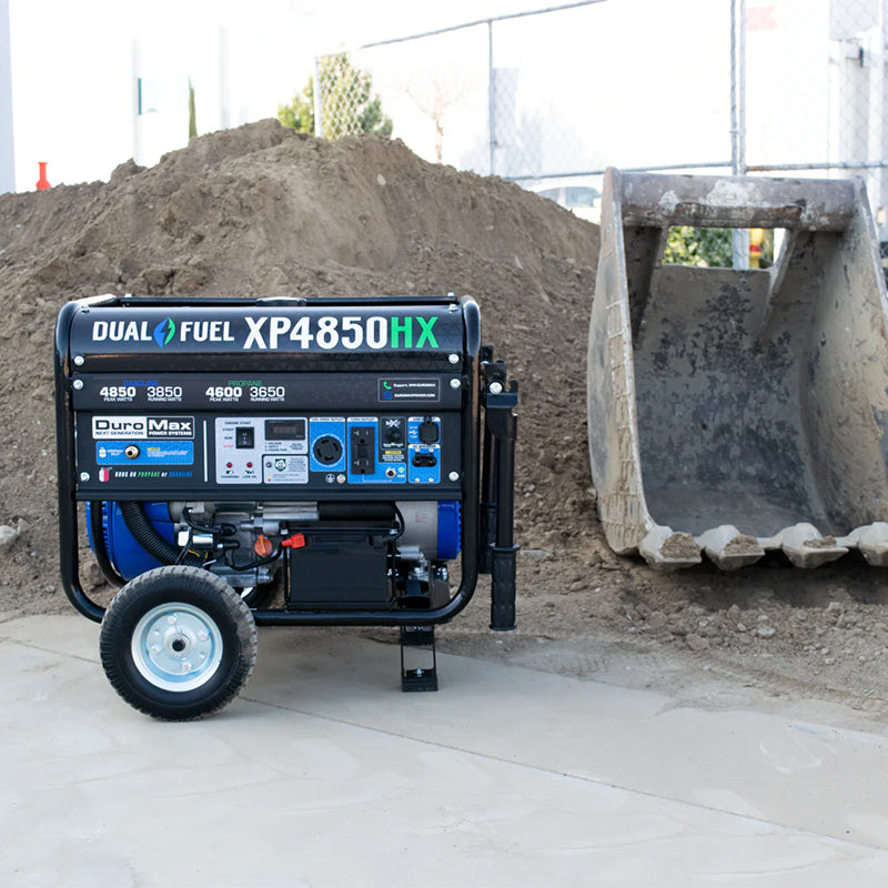 Duromax XP4850HX dual fuel quality generator stationed near a construction site, showcasing its robustness for heavy-duty use.