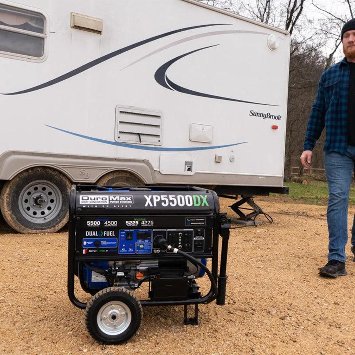 Duromax XP5500DX portable generator ready for use near an RV, emphasizing the convenience for travelers.