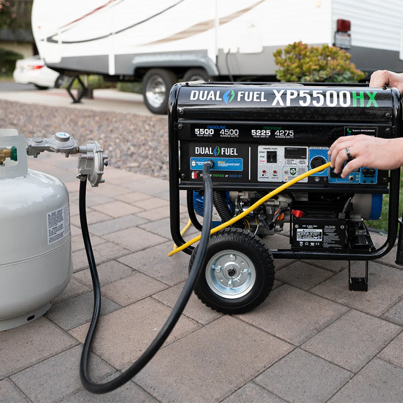 Close-up of a Duromax XP5500HX quality generator connected to a propane tank, demonstrating its dual-fuel capability.