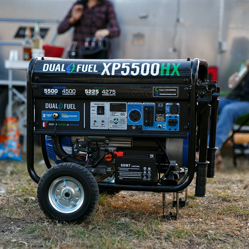 Duromax XP5500HX portable generator at a campsite, providing power for a pleasant and modern outdoor activity.