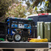 Duromax generator loaded in the back of a pickup truck, ready for transport, highlighting its portability and suitability for outdoor activities or remote job sites.