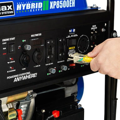Close-up of a hand plugging a cable into a DuroMax XP8500EH quality generator control panel.