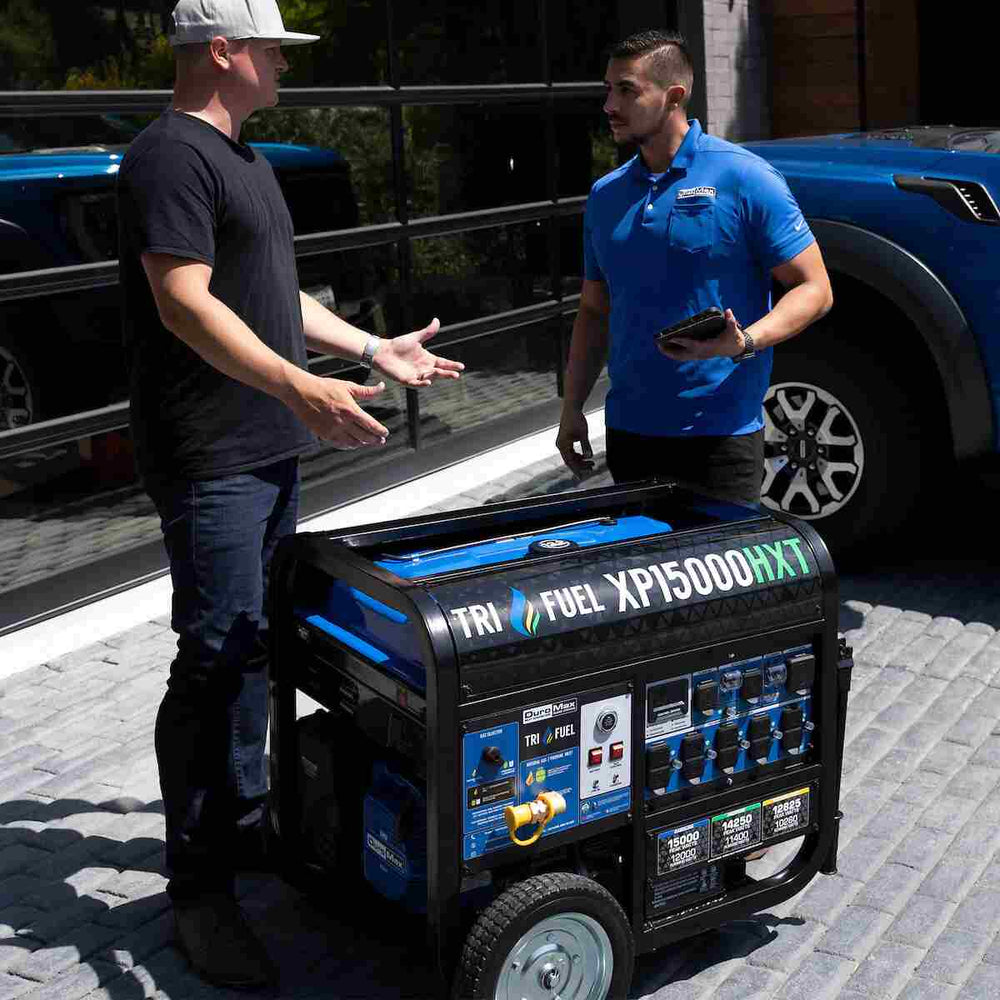 A propsective buyer speaks with a sales agent about the xp15000hxt portable generator