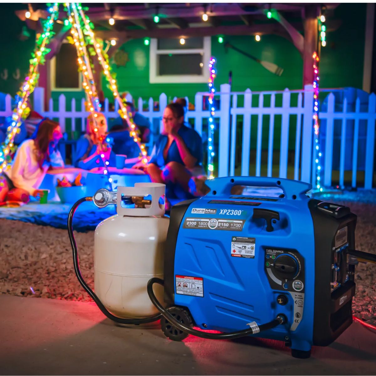 DuraMax XP2300iH fueled by propane powering late night backyard picnics