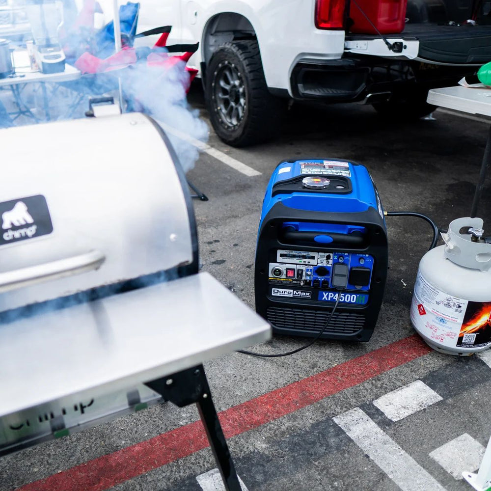 DuraMax XP4500iH powering electric grillers at outdoor barbeque party