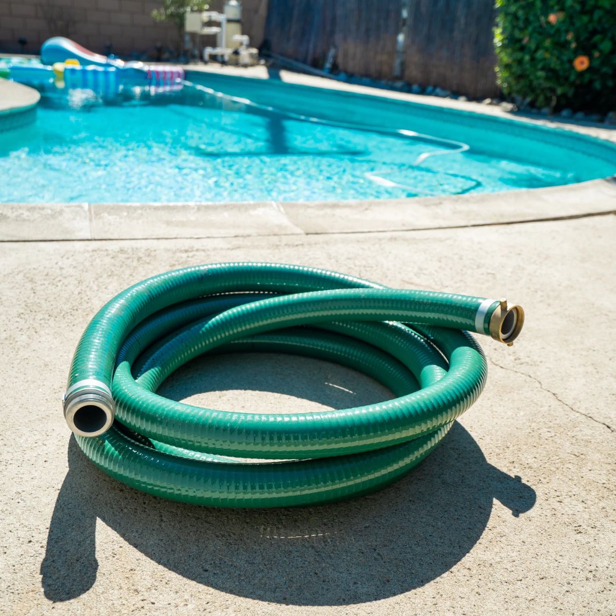 Slightly top view of DuroMax XPH210S Water Pump Hose at pool side