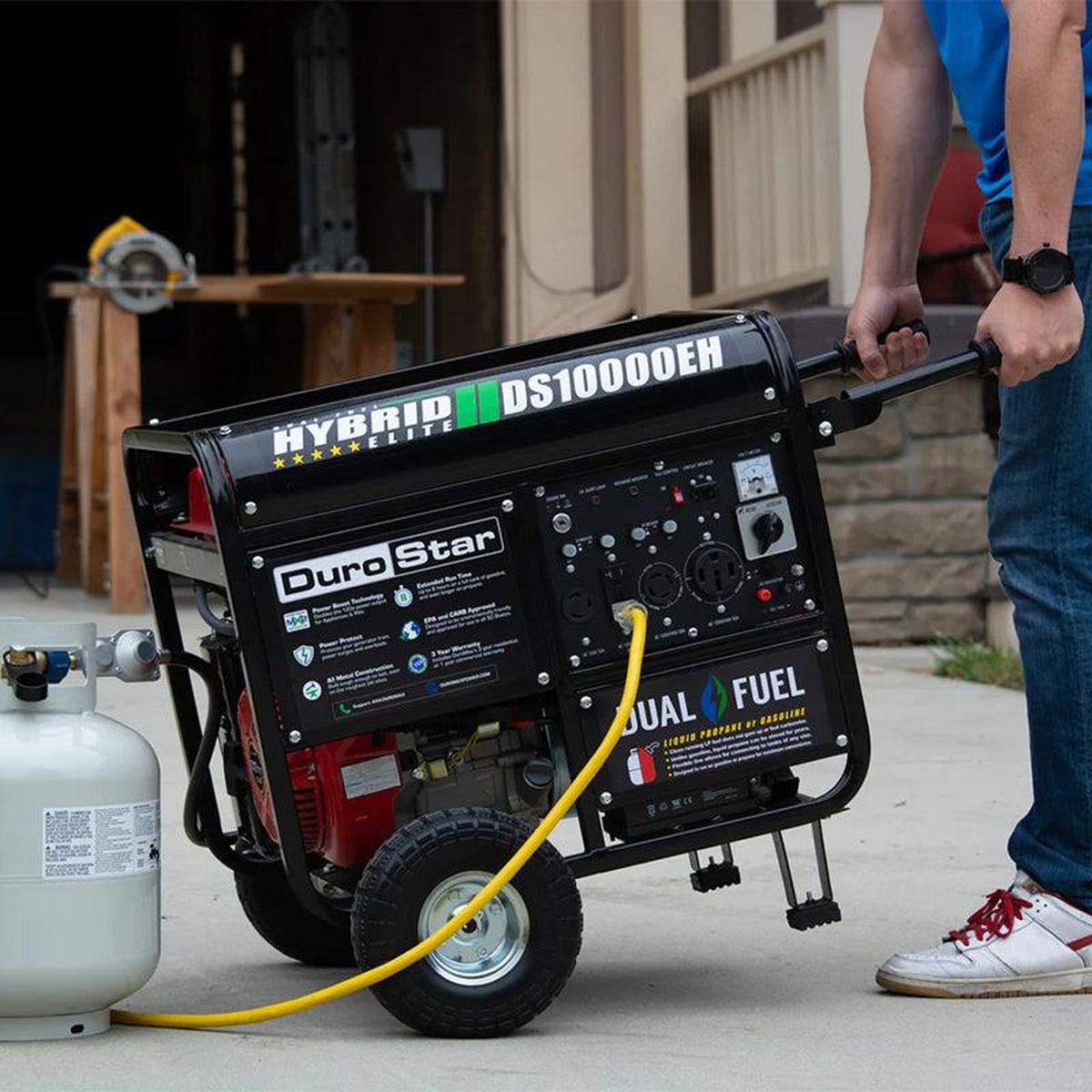 Easy-to-transport DuroMax DS10000EH portable generator with an extended handle for maneuverability, suitable for various settings.