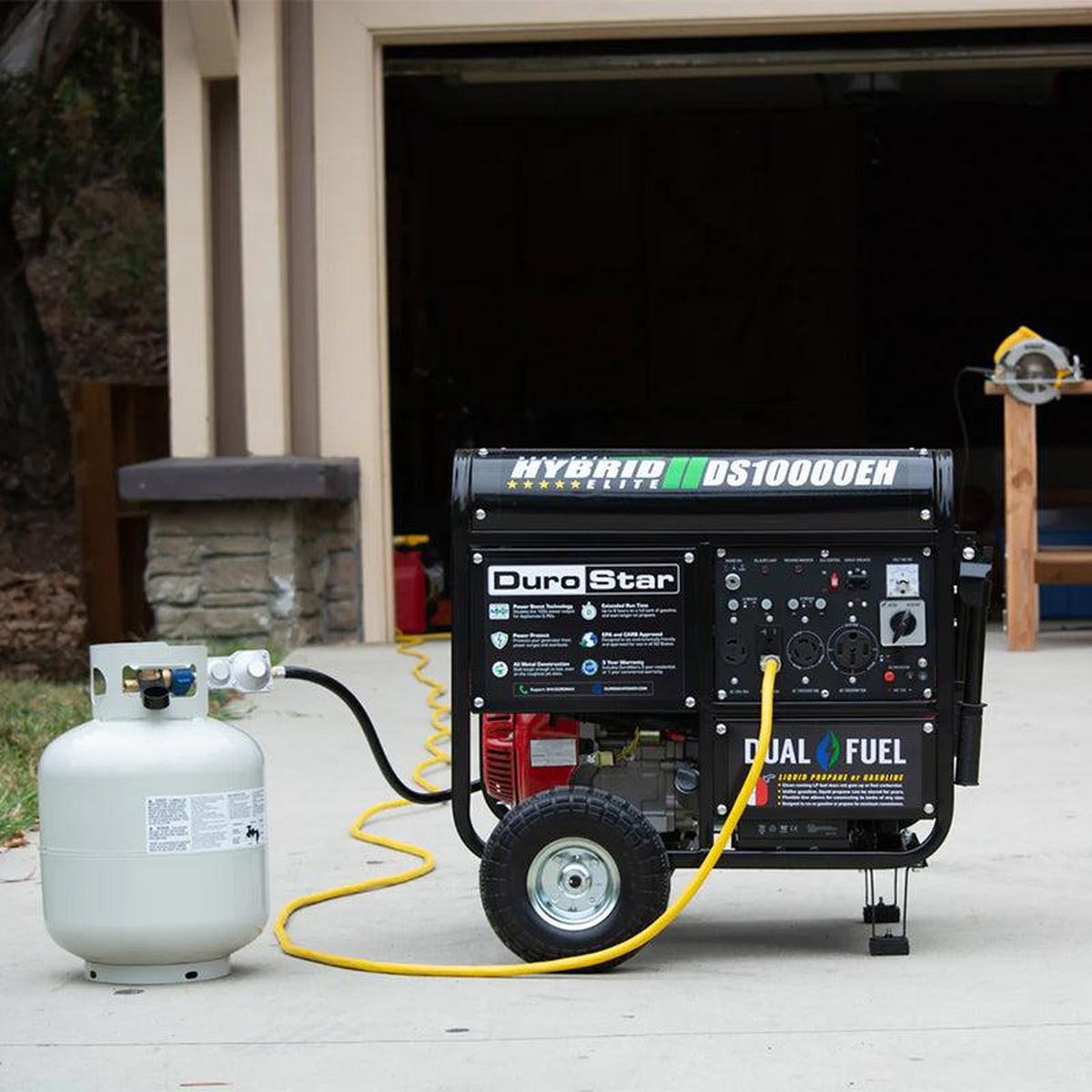 The DuroStar DS10000EH quality generator connected to a propane tank with a flexible yellow hose, demonstrating its dual fuel capability.