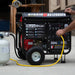 DuroStar DS12000EH Dual Fuel Portable Generator with propane tank, showcasing the versatility and efficiency of generators.