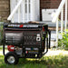 The DuroStar DS12000EH generator situated in a serene garden setting, a dependable and quality generator for any home.