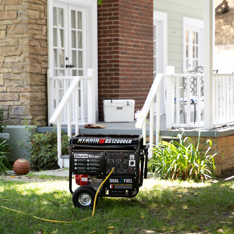 The DuroStar DS12000EH generator situated in a serene garden setting, a dependable and quality generator for any home.