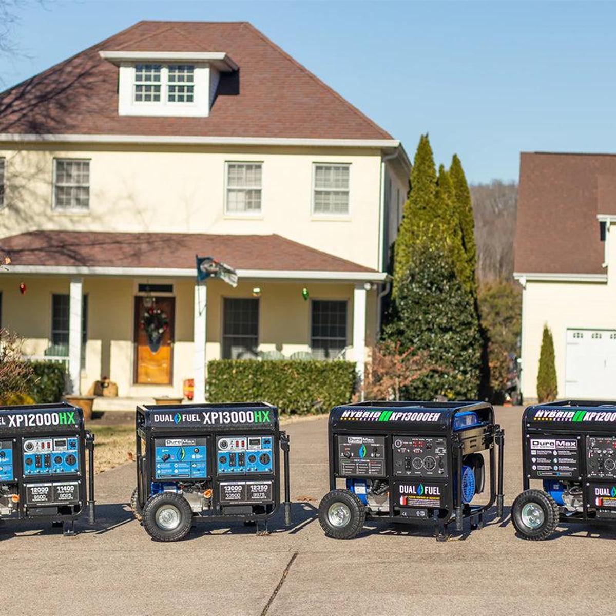 Collection of Duromax generators outside a house, showcasing the versatility and options for portable power solutions by Duromax.