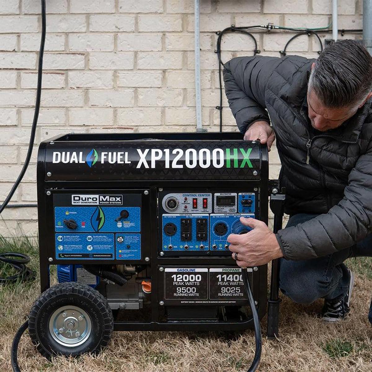 Close-up of a person's hand starting a DuroMax portable generator, highlighting the ease of use and accessibility of quality generators.
