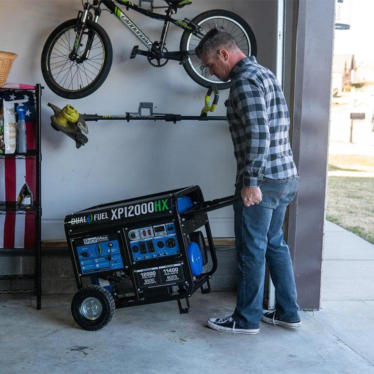 Man inspecting a Duromax XP12000HX generator in a garage, emphasizing the generator's ease of use and storage in home settings.