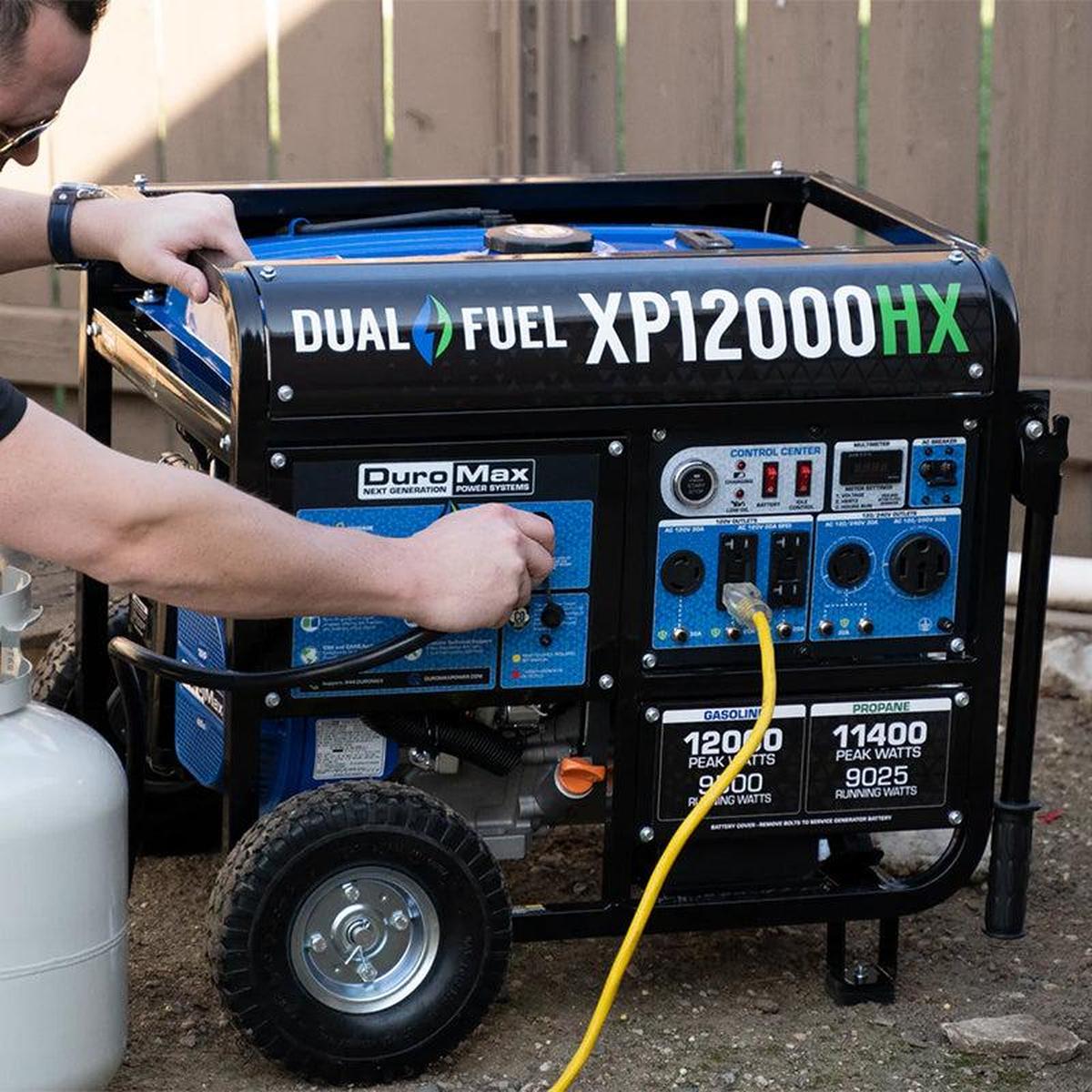 Man connecting a propane tank to a quality generator, showcasing the dual-fuel capability of DuroMax portable generators.