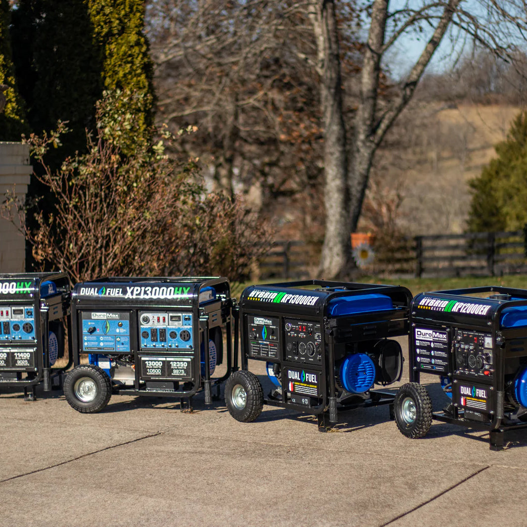 A lineup of Duromax portable generators of various models displayed outdoors, highlighting the range of quality generators available from Duromax.