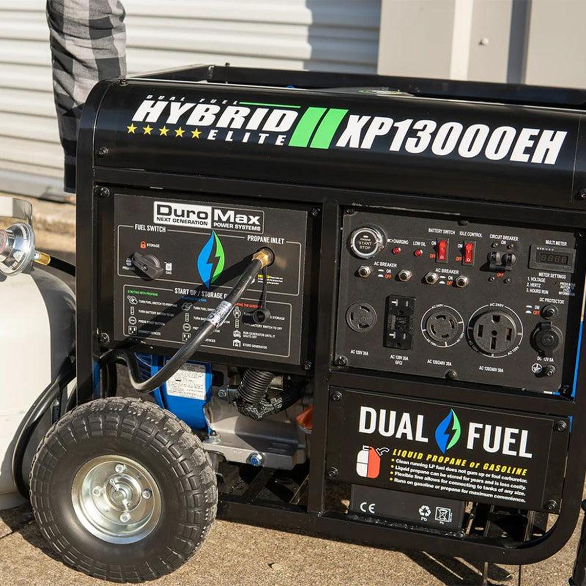 Close-up of a DuroMax hybrid portable generator's control panel, highlighting the dual fuel switch and propane inlet.