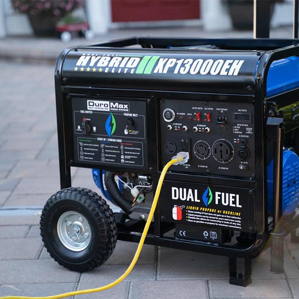 DuroMax XP13000EH generator displayed outside a house, showcasing its portability and size.