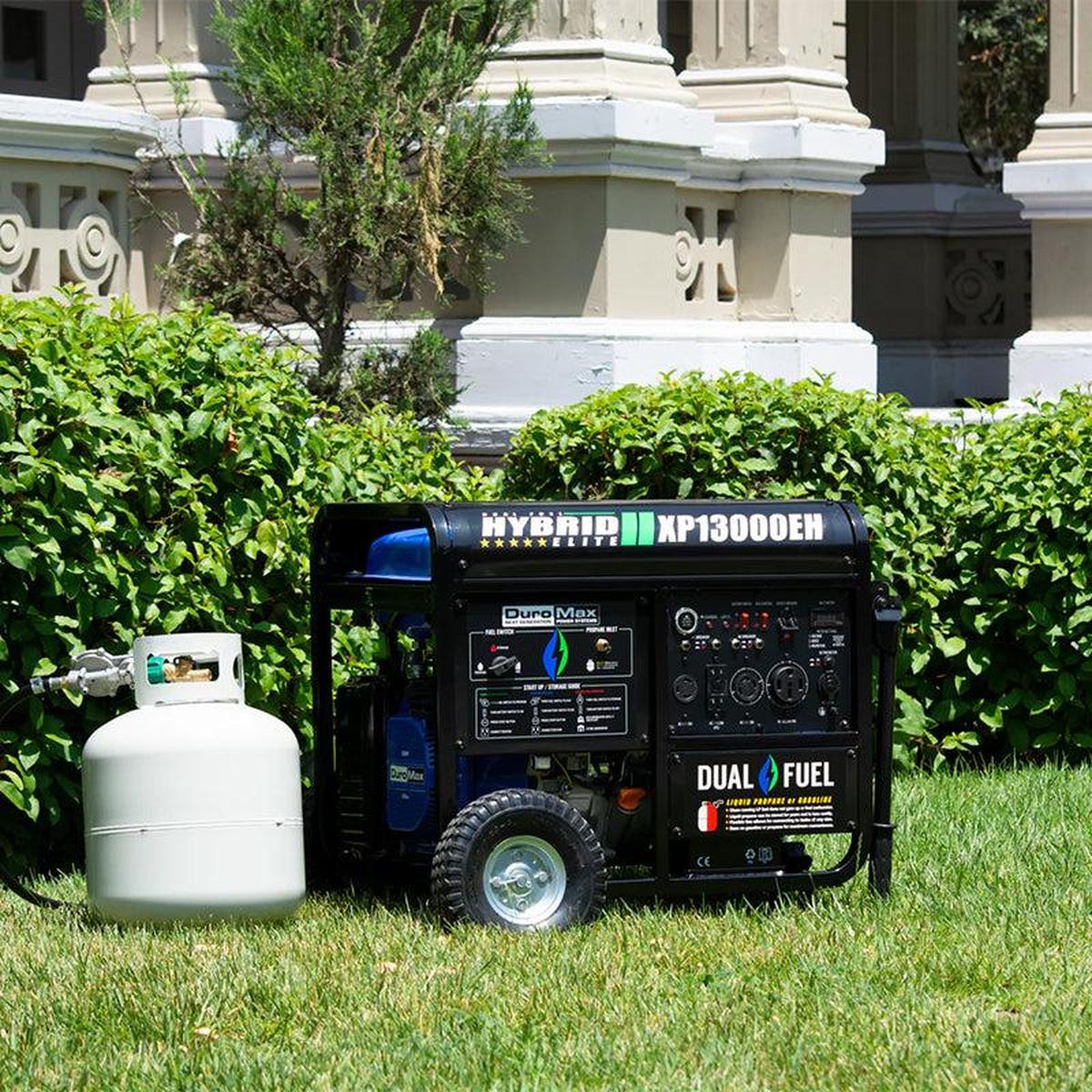 Quality DuroMax generator with propane tank on a lush lawn, emphasizing the aesthetic integration into home backup settings.