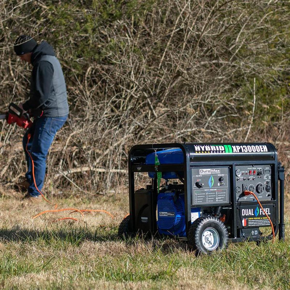 Outdoor use of a DuroMax portable generator, showcasing its portability and utility in various settings.