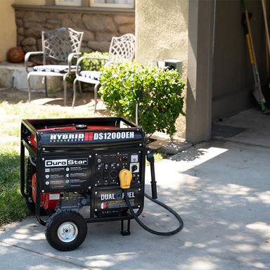 The DuroStar DS12000EH generator situated in a serene garden setting, a dependable and quality generator for any home.