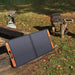 Front panel of Jackery Explorer 500 Portable Power Station displaying its capability to charge using solar panel while simultaneously charging other devices