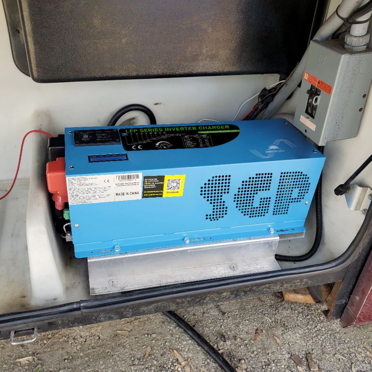 SunGold Power LFP3K12V120VSG 3000 Watts Pure Sine Wave Inverter displaying its actual working setup inside the back of a RV.