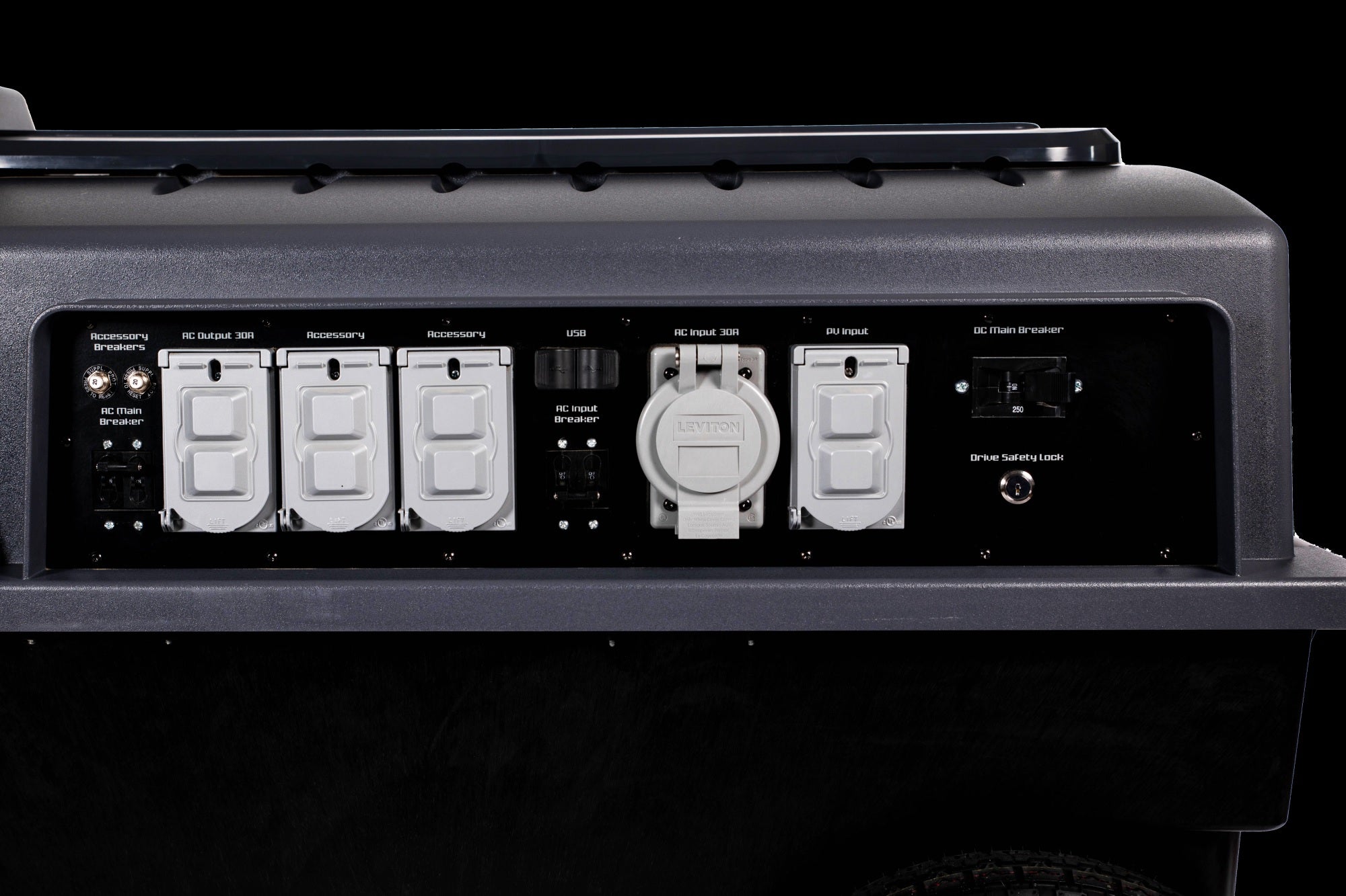 A focused view of the ports and control switches panel of UNIVIX 12000 Bank w/Carbon Battery + Gen 2 Inverter