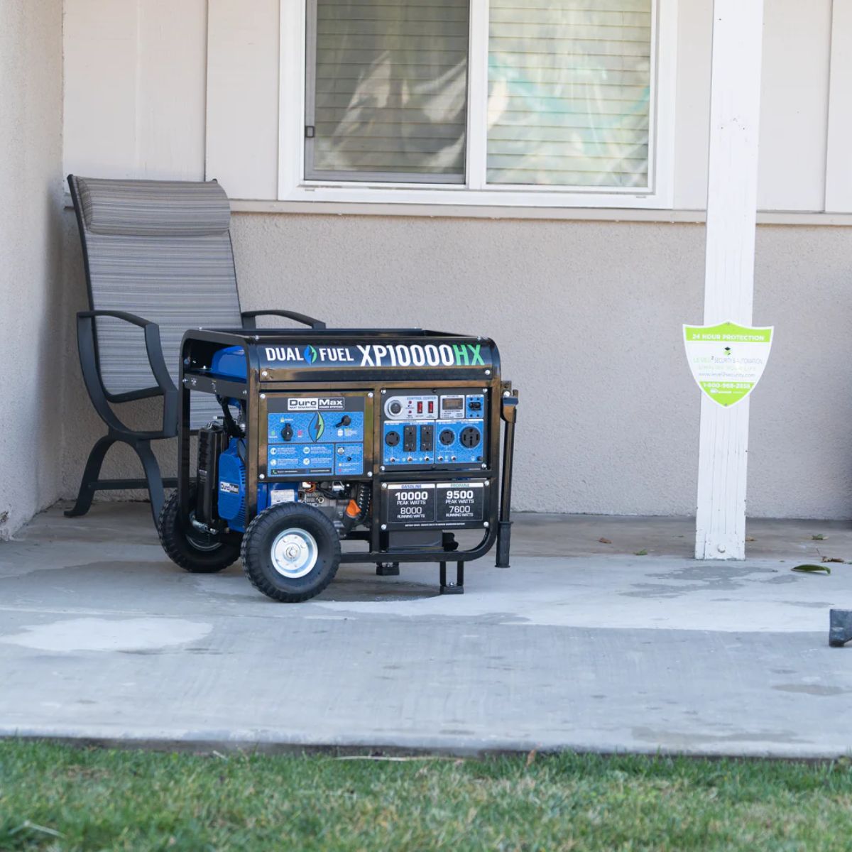 DuroMax XP10000HX at the back of the house displaying its portablilty